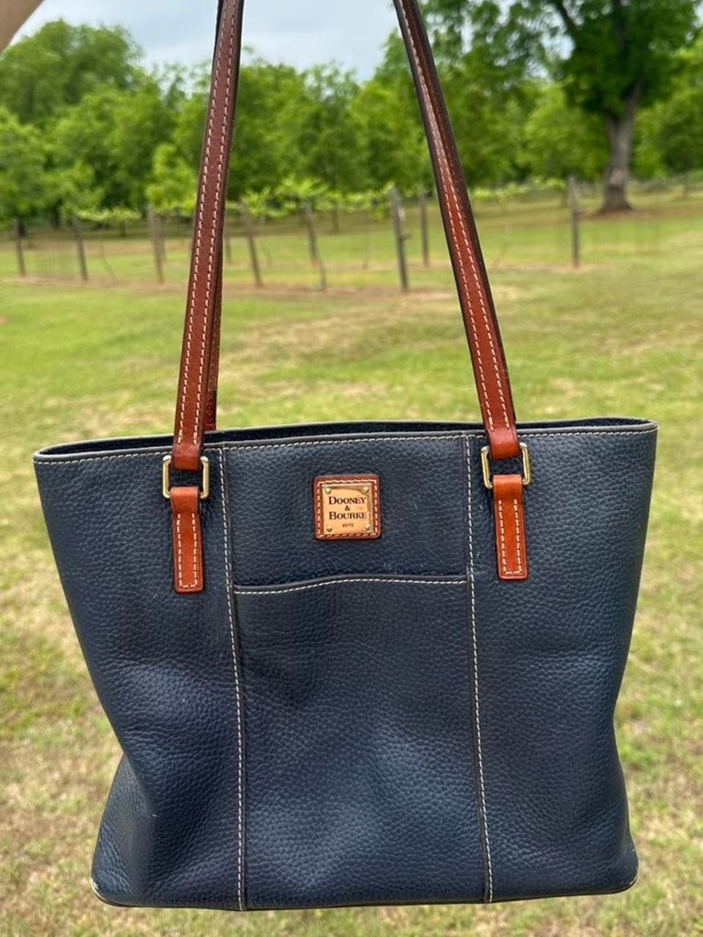 Dooney & Bourke Navy Pebbled Leather Tote with Brown Straps and Trim